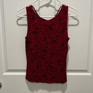Sequined red and black tank!  Looks great with black pants!  Easy dress up!
